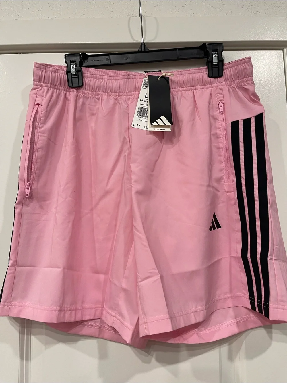 adidas Pink Athletic Shorts with Black Stripe Detail